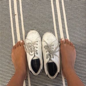 Well worn women’s sneakers